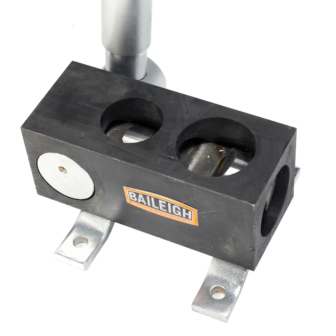 Angled view of the notching block on the Baileigh Manual Pipe Notcher TN-200M 1008032 showing the robust steel construction and mounting brackets for shop installation.