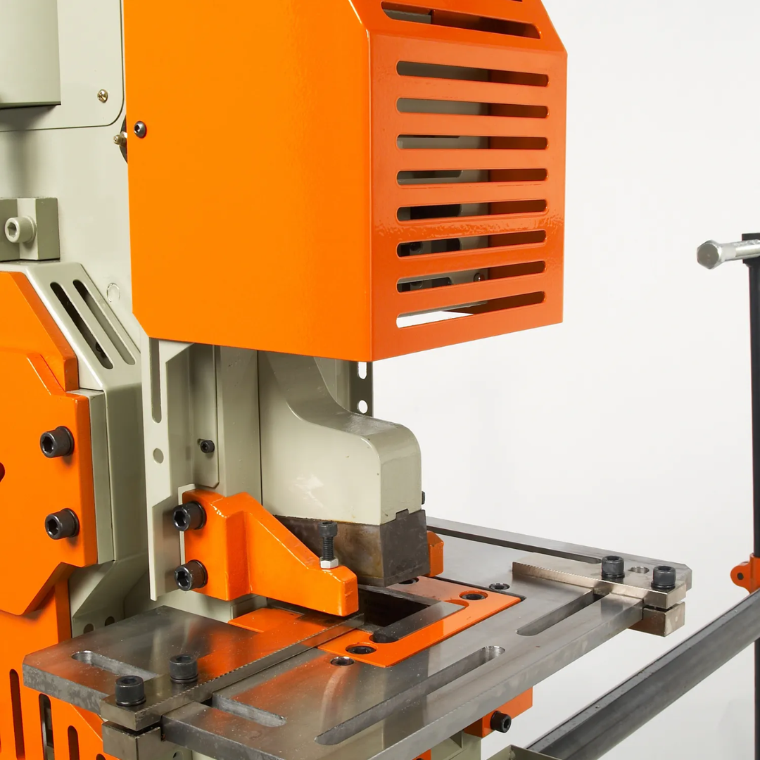 Baileigh 62-Ton 5-Station Ironworker SW-623 1007812 close-up of the hydraulic punching head with heavy-duty construction and precision tooling for industrial punching applications.