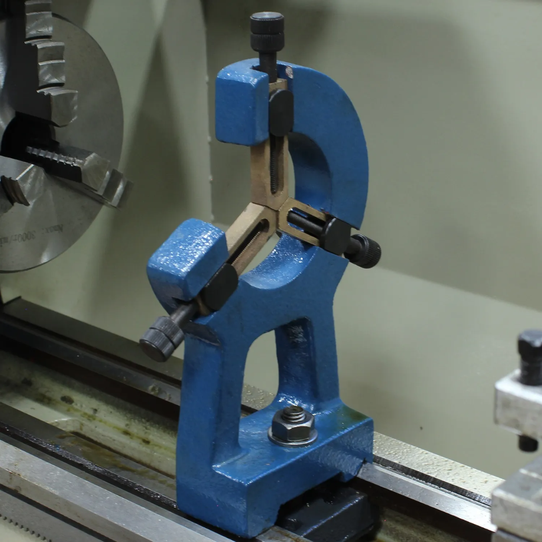 Baileigh Bench Lathe PL-1022VS-V2 1228215 adjustable tailstock assembly providing support for longer workpieces during machining operations.