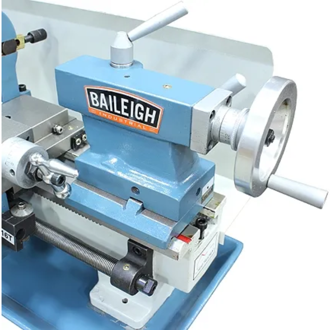 Baileigh Bench Top Lathe (PL-714VS-V2) 1228214 angled front view highlighting the headstock, chuck, bedways, and precision bench-mounted metal turning system.