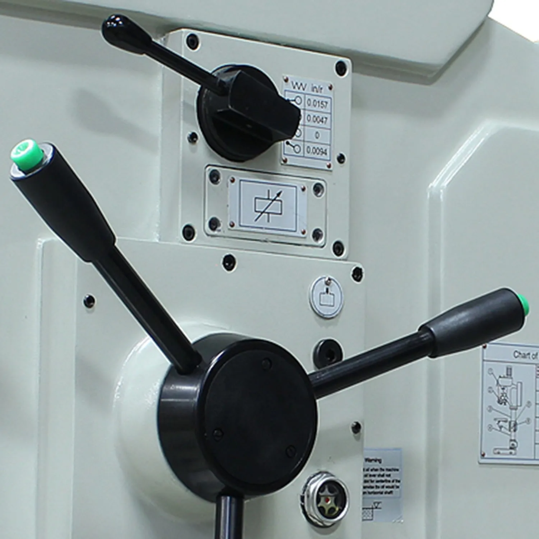Baileigh Gear Driven Drill Press - DP-1850G 1020697 control head close-up highlighting the gear-driven speed selector levers and industrial control panel for accurate spindle speed adjustment.