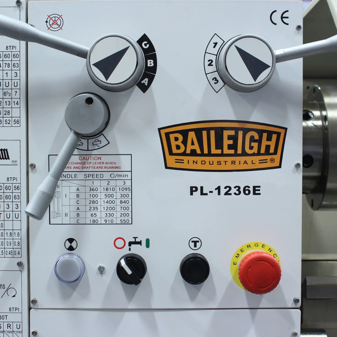 Baileigh Metal Lathe PL-1236E 1016616 operator control panel featuring spindle controls, feed adjustments, and machine operation functions for precision machining tasks.