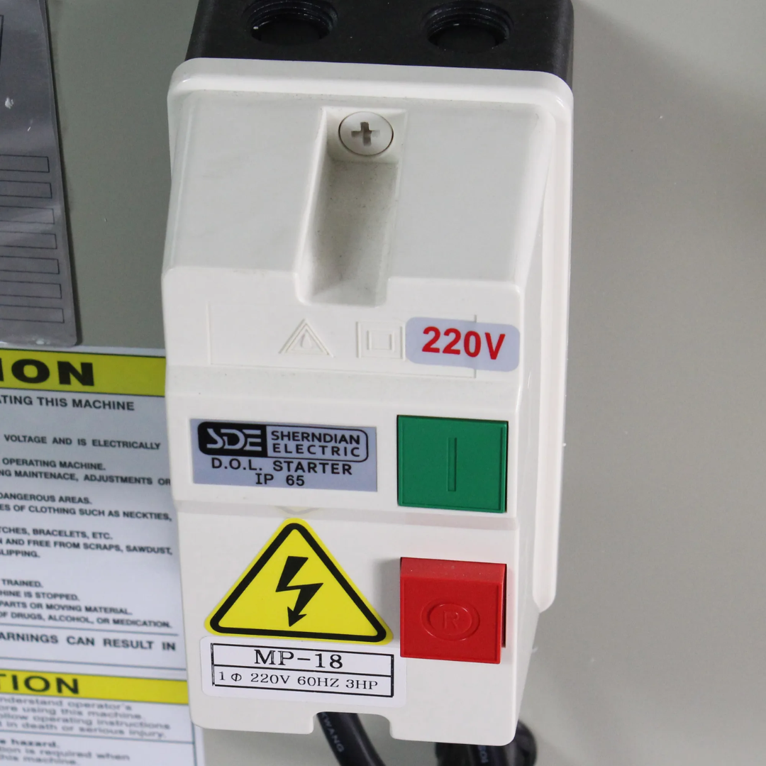 Baileigh Metalworking Dust Collector, 1450 CFM, 220V 1Ph (MDC-1800) industrial electrical control panel featuring operator controls and safety components for reliable operation.