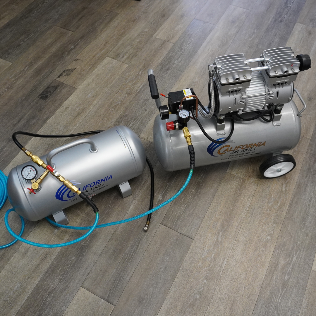 California Air Tools AUX20S 20 Gallon Steel Portable Auxiliary Air Tank connected inline to compressor system showing airflow direction