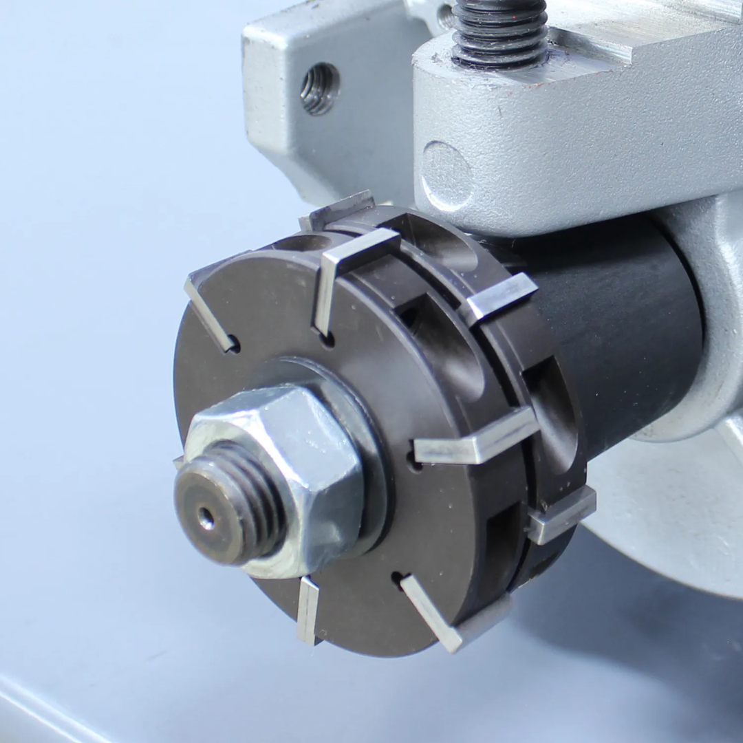 Close-up cutting head assembly on the Baileigh Electric Plate and Pipe Beveler (CM-060PR) 1016602 showing precision-machined beveling tooling and cutter configuration.