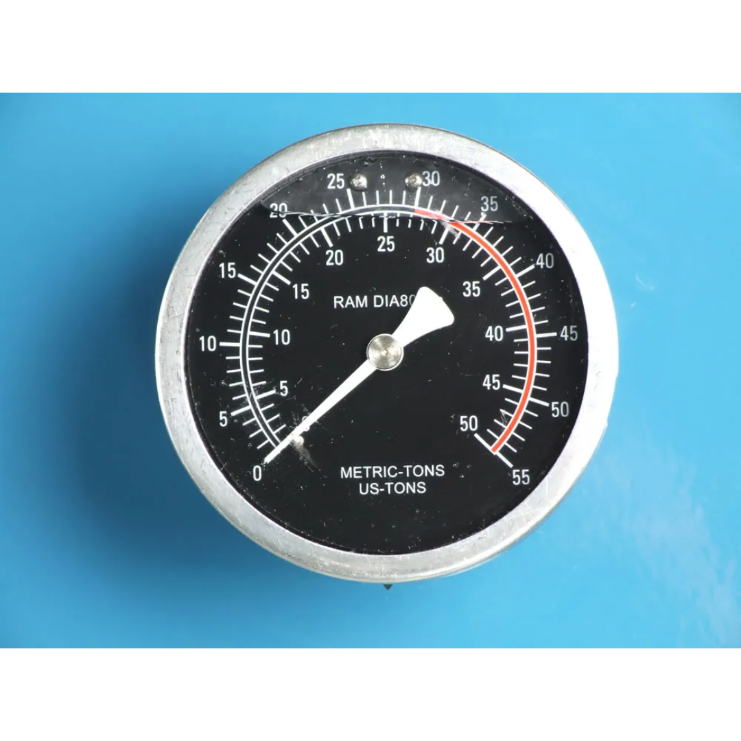 Close-up of Baileigh 30-Ton Pneumatic H-Frame Shop Press (HSP-30A) 1004816 integrated pressure gauge providing accurate monitoring of applied pressing force during operation.