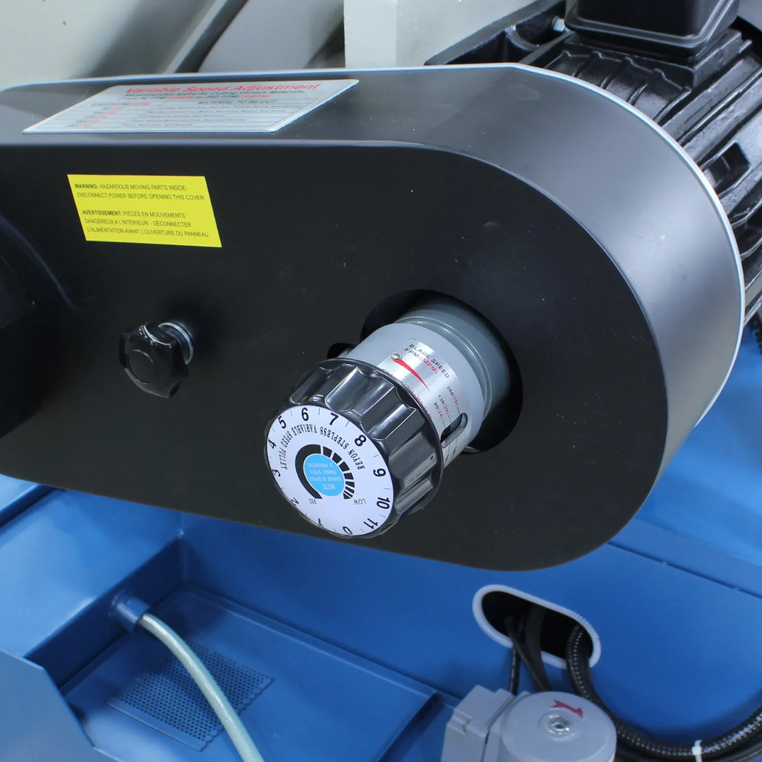 Close-up of the blade drive and tension adjustment assembly on the Baileigh Metal Cutting Bandsaw - BS-330M 1001517 highlighting the precision adjustment mechanism for optimal blade performance.