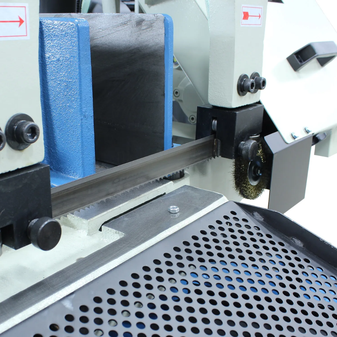 Close-up of the blade guide assembly on the Baileigh Metal Cutting Bandsaw - BS-330M 1001517, highlighting the precision guide bearings and rigid construction for accurate, straight metal cuts.
