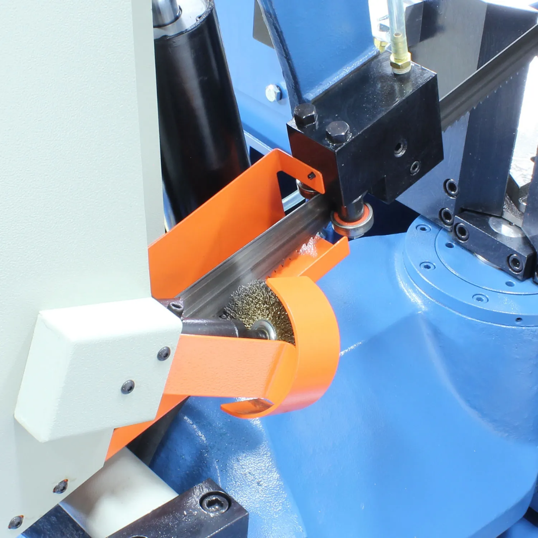 Detail of the adjustable blade guide assembly on the Baileigh 13-Inch Dual-Mitering Semi-Automatic Bandsaw (BS-20SA-DM) 1001298 displaying the precision guide arms and blade support system for accurate cutting performance.