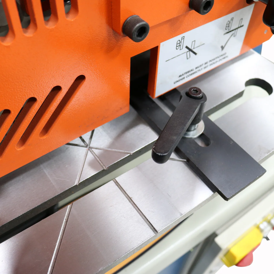 Detailed view of the Baileigh 44-Ton 4-Station Hydraulic Ironworker, 220V 1Ph (SW-441) 1007756 flat bar shear station designed for clean, repeatable cutting of steel materials.