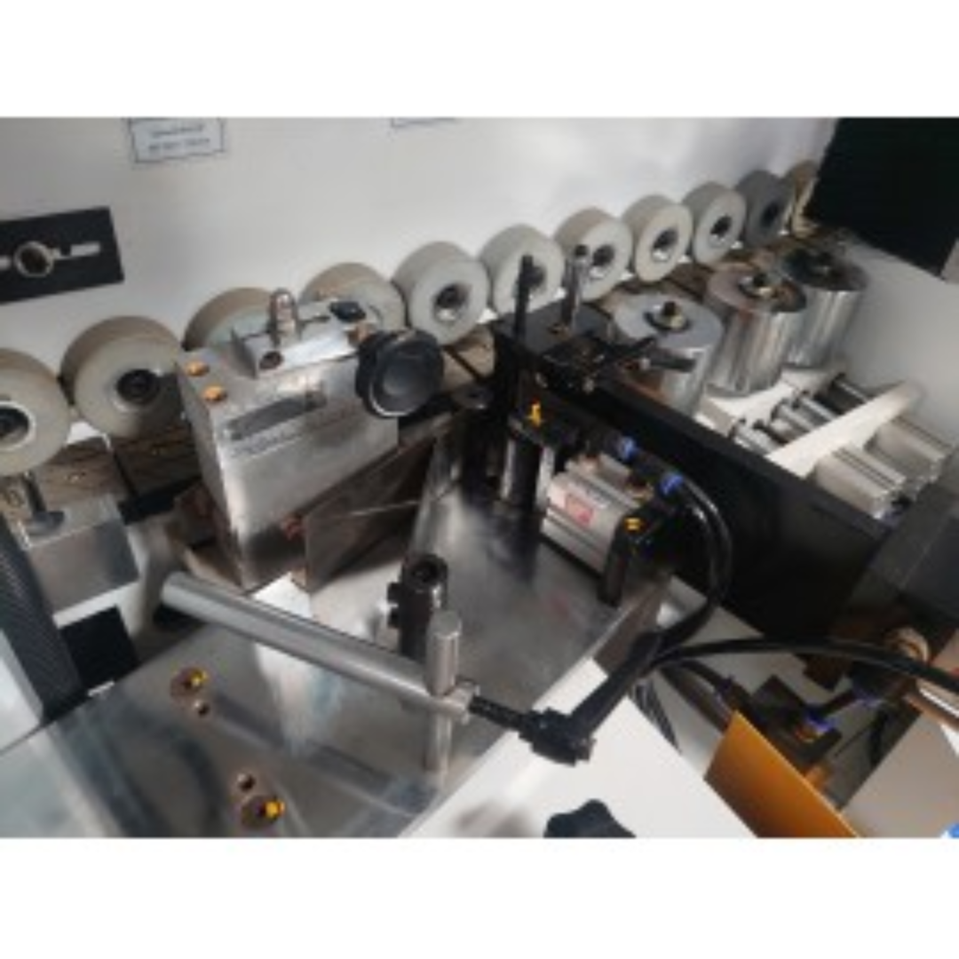 Edge bander EB-M4U pre-mill and trimming motor stations close-up showing multi-stage edge processing
