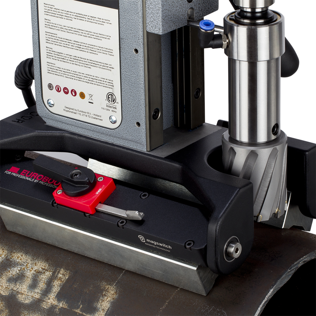 Euroboor TUBE.55S+/T Magnetic Drilling Machine angled view displaying the drilling motor, capstan handles, and pipe clamping base designed for precise drilling on cylindrical materials