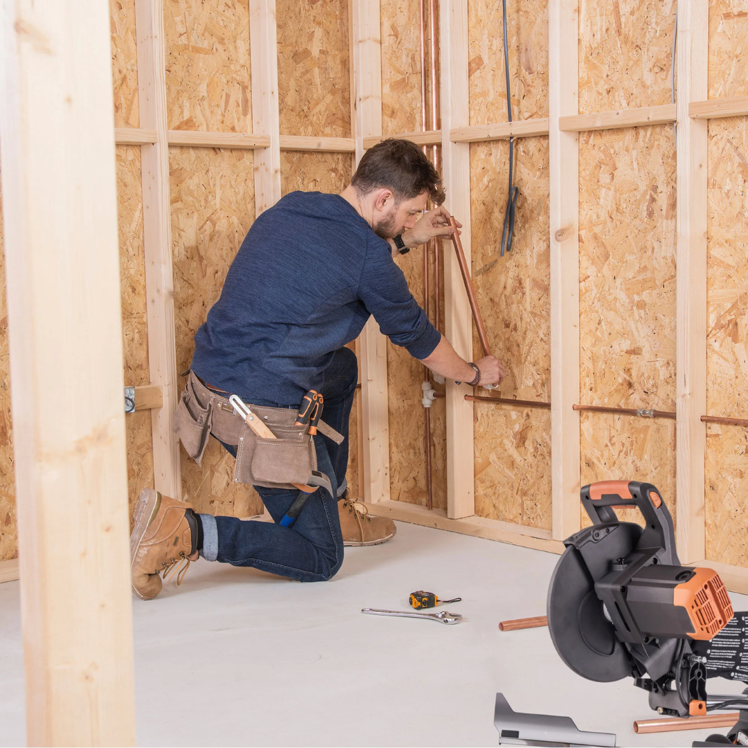 Evolution Power Tools Single Bevel Sliding Miter Saw R255SMS+ being used on a construction jobsite for fast and accurate material cutting.