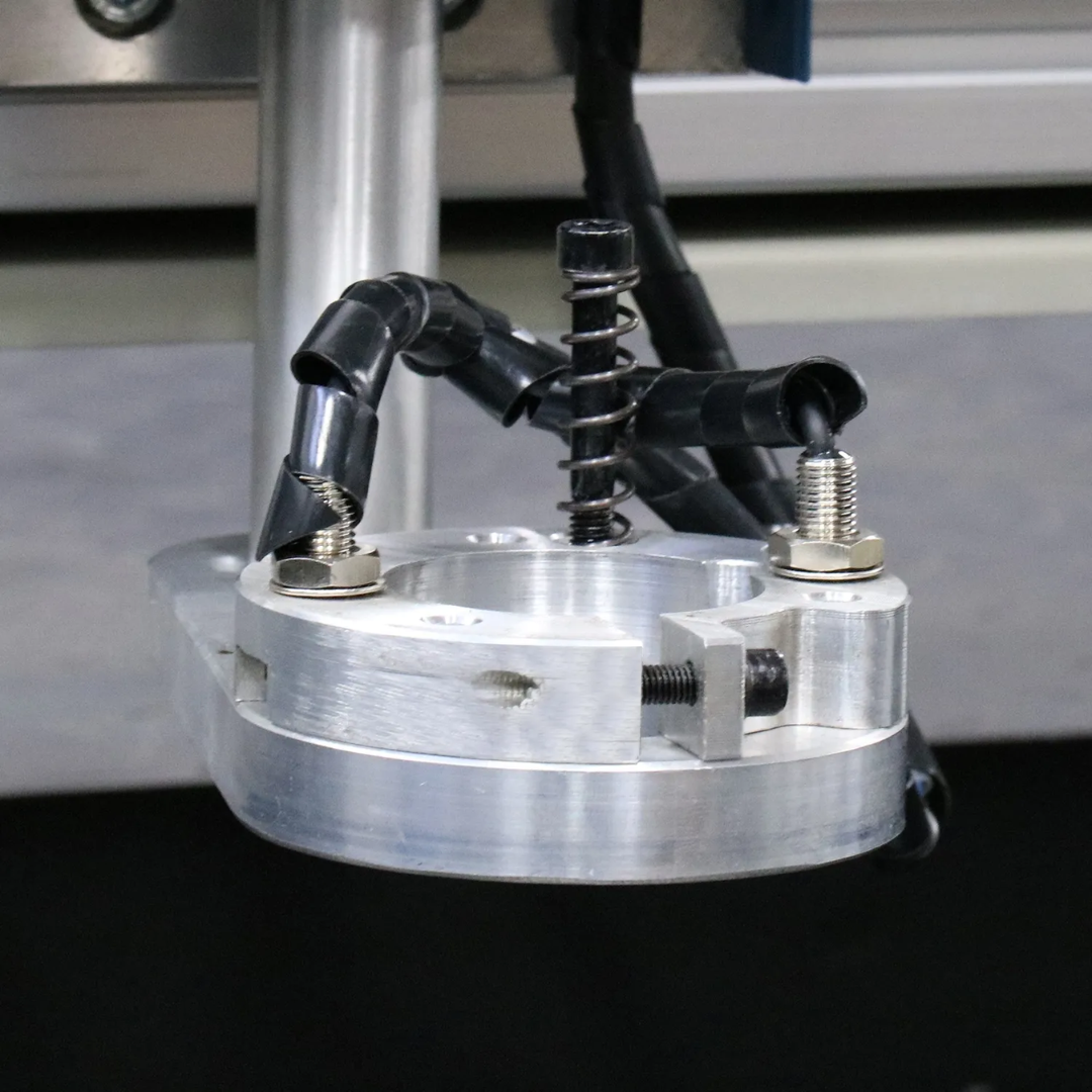 Floating torch head assembly on the Baileigh CNC Plasma Table PT-44AH-W 1225307 for accurate torch height positioning during plasma cutting.
