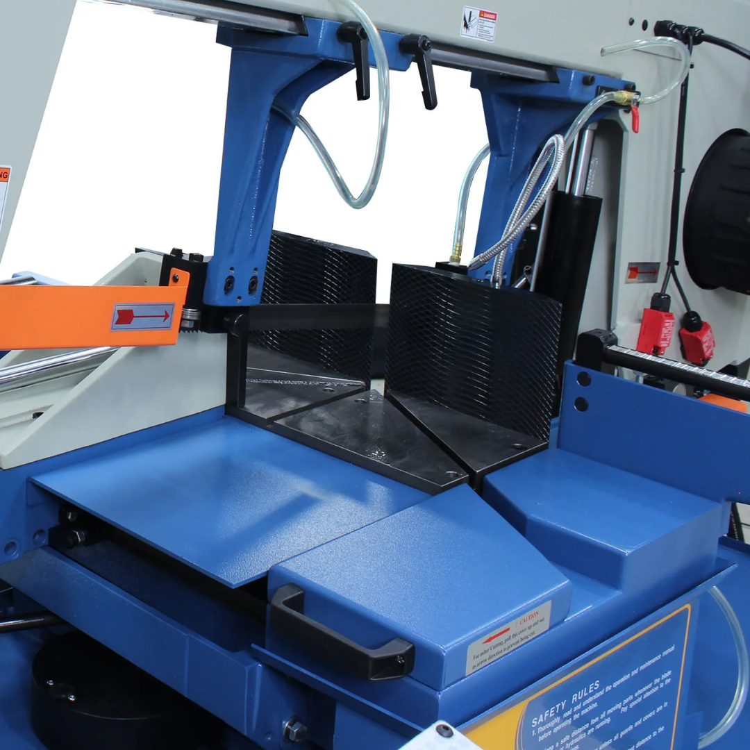 Front view of the workholding area on the Baileigh 13-Inch Dual-Mitering Semi-Automatic Bandsaw (BS-20SA-DM) 1001298 highlighting the heavy-duty vise, blade path, and material support table for secure metal cutting operations.