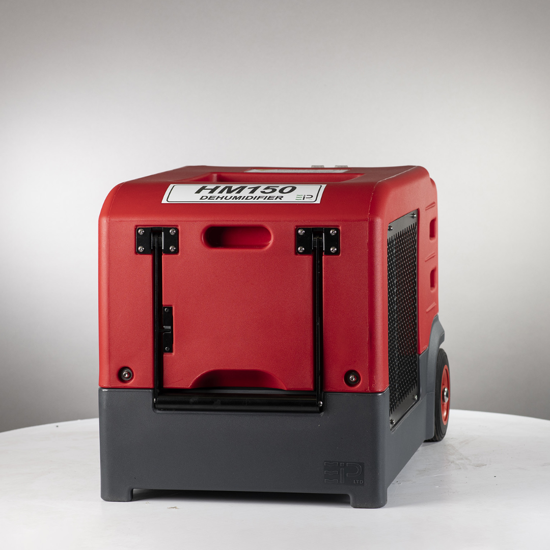 Heavy-duty portable Ebac HM150/HM150-H Dehumidifier with rugged red housing, rear air intake panel, and integrated transport wheels for commercial restoration drying