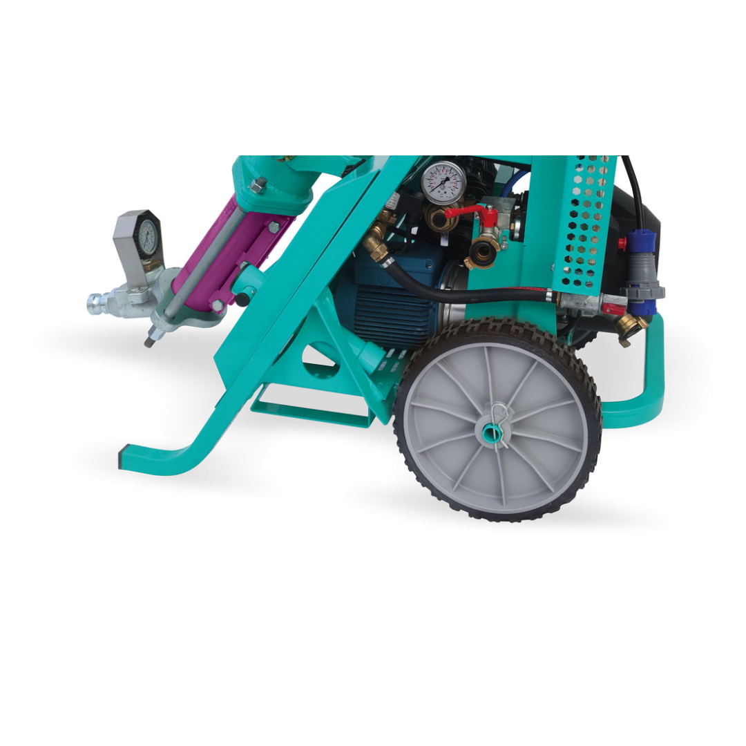 IMER KOINE 3.1 Continuous Mixer/Pump lower frame and pumping assembly side view showing durable wheel system, pumping mechanism, and reinforced support structure.
