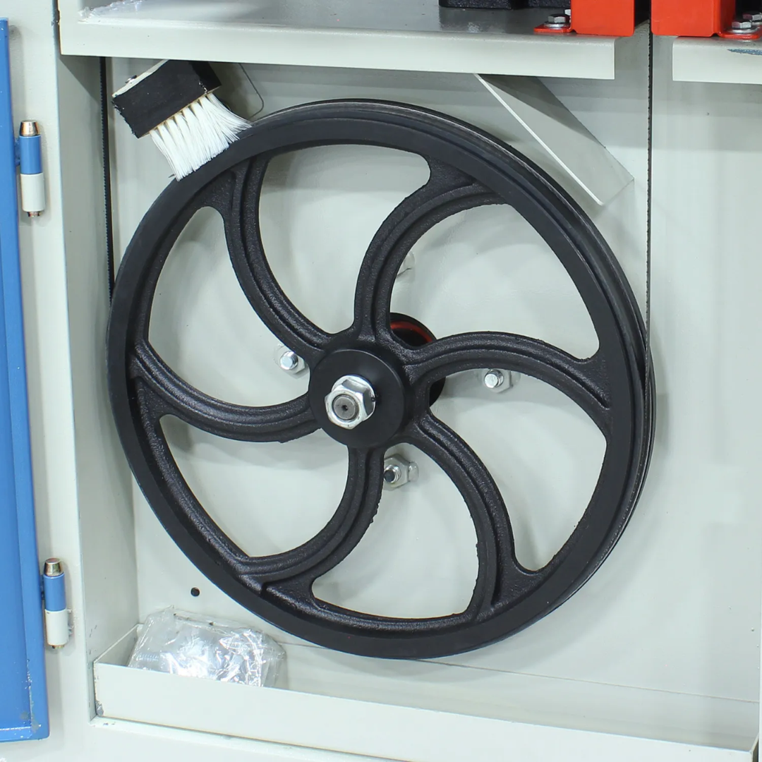 Interior drive system of the Baileigh Vertical Bandsaw BSV-12VS-V2 1230387 showing the heavy-duty belt and wheel assembly designed for reliable power transmission and long service life.