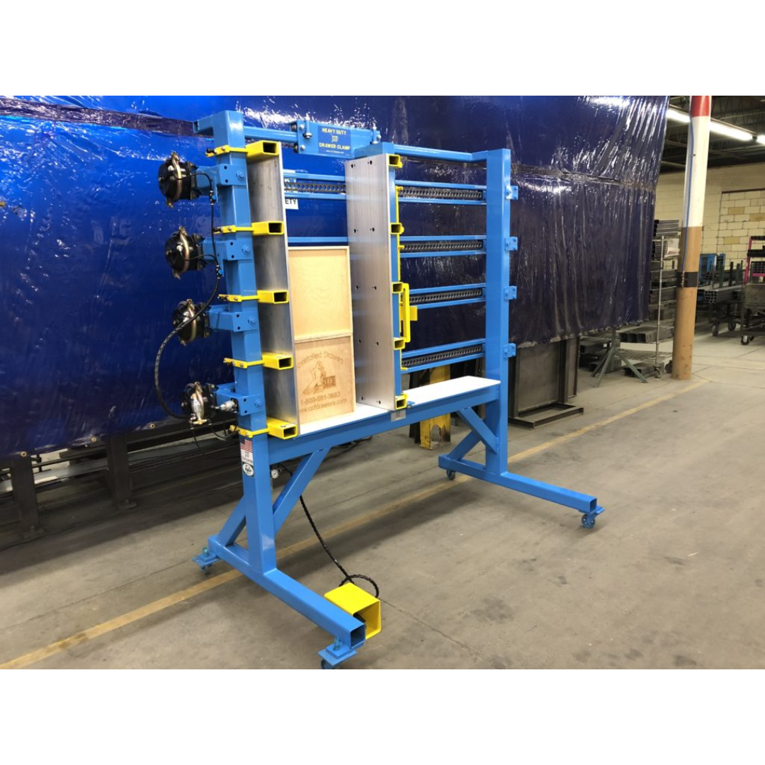 JLT #190C Large Capacity Drawer & Box Clamp in operation with operator positioning drawer components for precise squaring