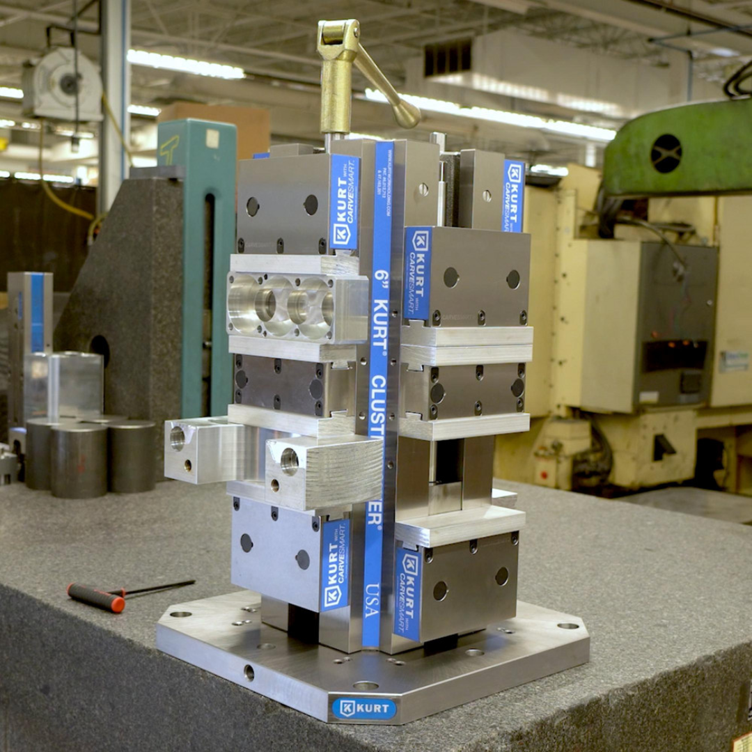 Kurt Machine Vise: 8-Station, 6.0000" Jaw Width, 11" Jaw Opening, Stationary Base, Precision CTTL66CS mounted on machining equipment, demonstrating secure multi-part clamping, repeatable positioning accuracy, and high-density workholding efficiency.
