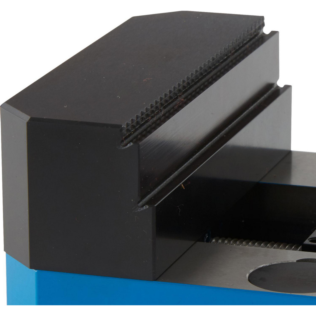 Kurt Modular Serrated Vise: 4" Jaw Width, 1.2500" Jaw Height PF460S close-up view highlighting serrated jaw surfaces, rigid vise body, and precision-engineered clamping system for repeatable part positioning and machining accuracy.
