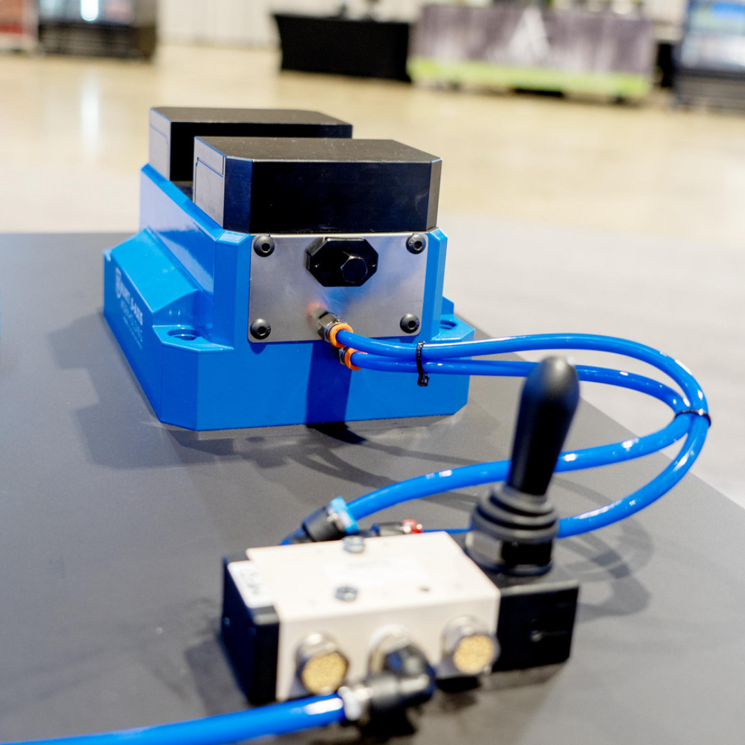 Kurt Self-Centering Vise: PF, 2.4300" Max Jaw Opening 79566253 installed in a machining setup, highlighting the self-centering clamping mechanism and precision workholding capabilities for automated production environments.