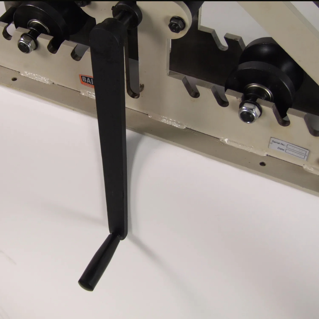 Lower operating handle view of the Baileigh Radius Bender - (R-M7) 1006861 showing the manual control mechanism used during forming operations.
