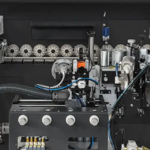 Maksiwa Edgebander CBC.TPM - Pre-Milling control section close-up showing switches, wiring, and machine controls