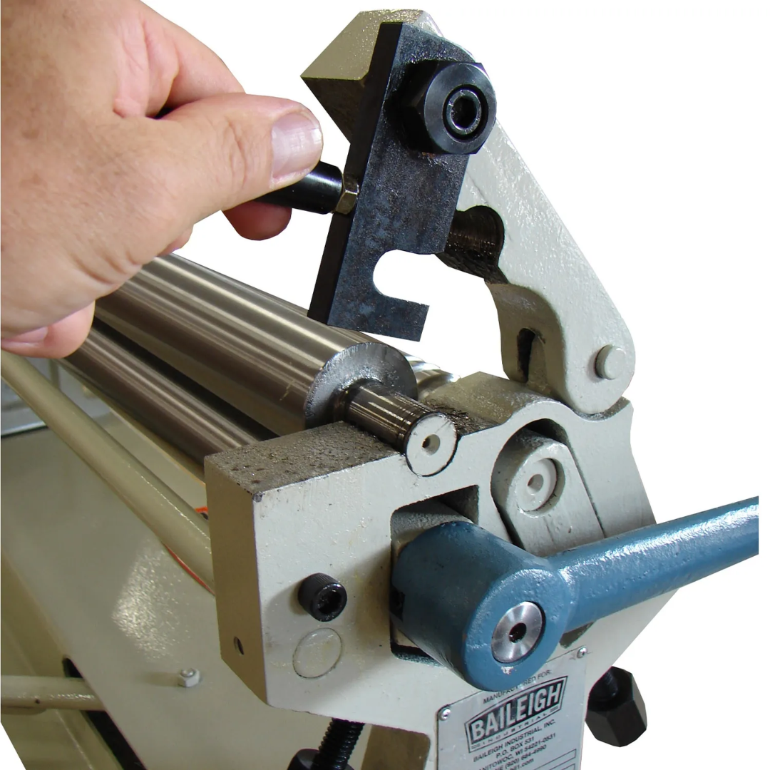 Quick-release top roll feature on the Baileigh Manual Slip Roll Machine - (SR-2420M) 1007297 allowing efficient removal of finished cylindrical workpieces.