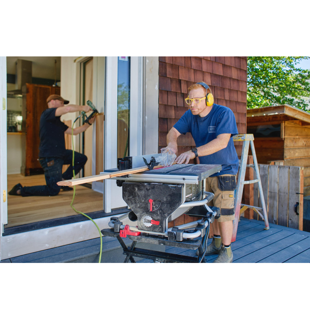 SawStop Compact Table Saw in active use during woodworking operations, demonstrating precision cutting and user-friendly controls.