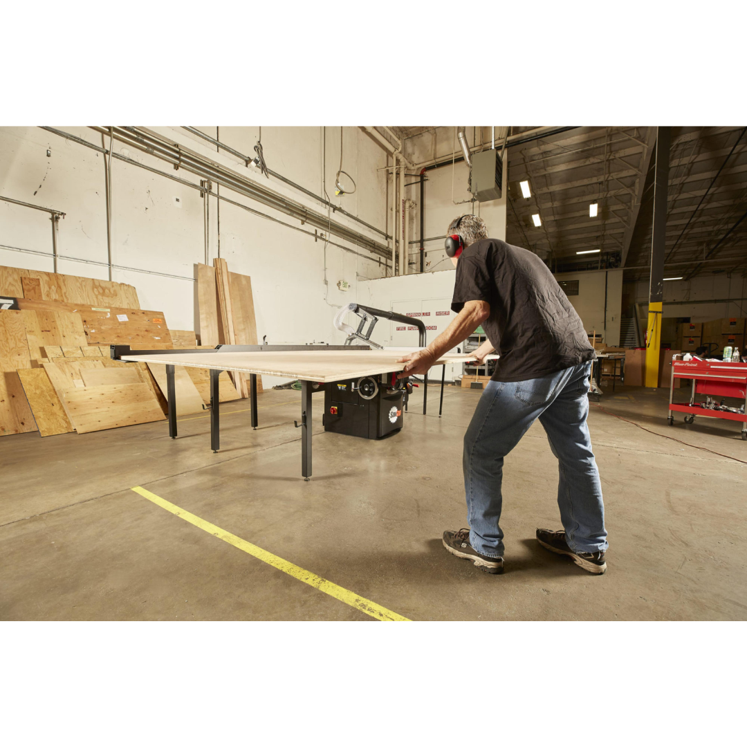 SawStop Large Sliding Table TSA-SA70 being used for panel processing, showcasing effortless material movement and efficient handling of large workpieces..