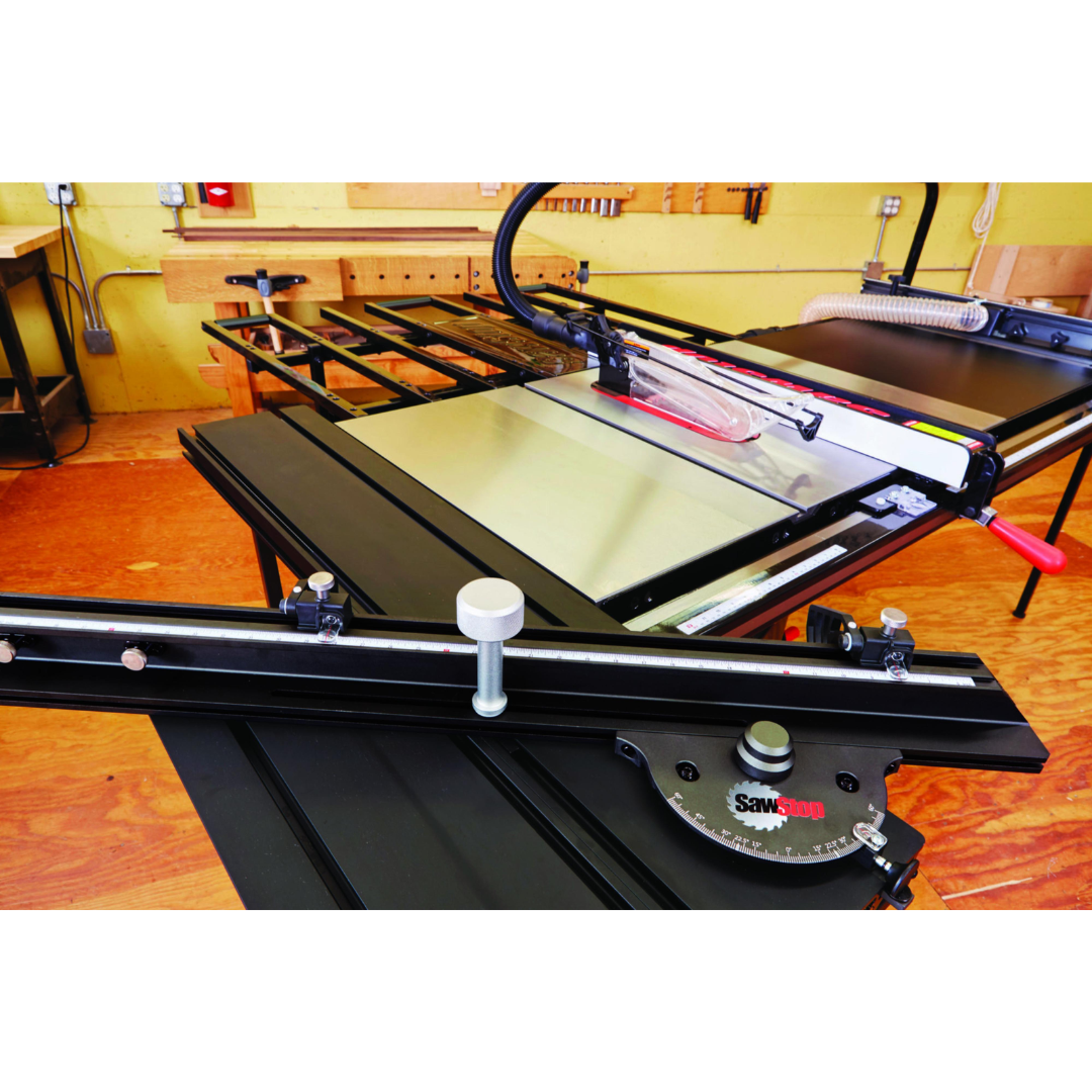 SawStop Sliding Crosscut Table TSA-SA48 installed on a workshop table saw, showcasing the sliding mechanism and enhanced material handling capabilities.