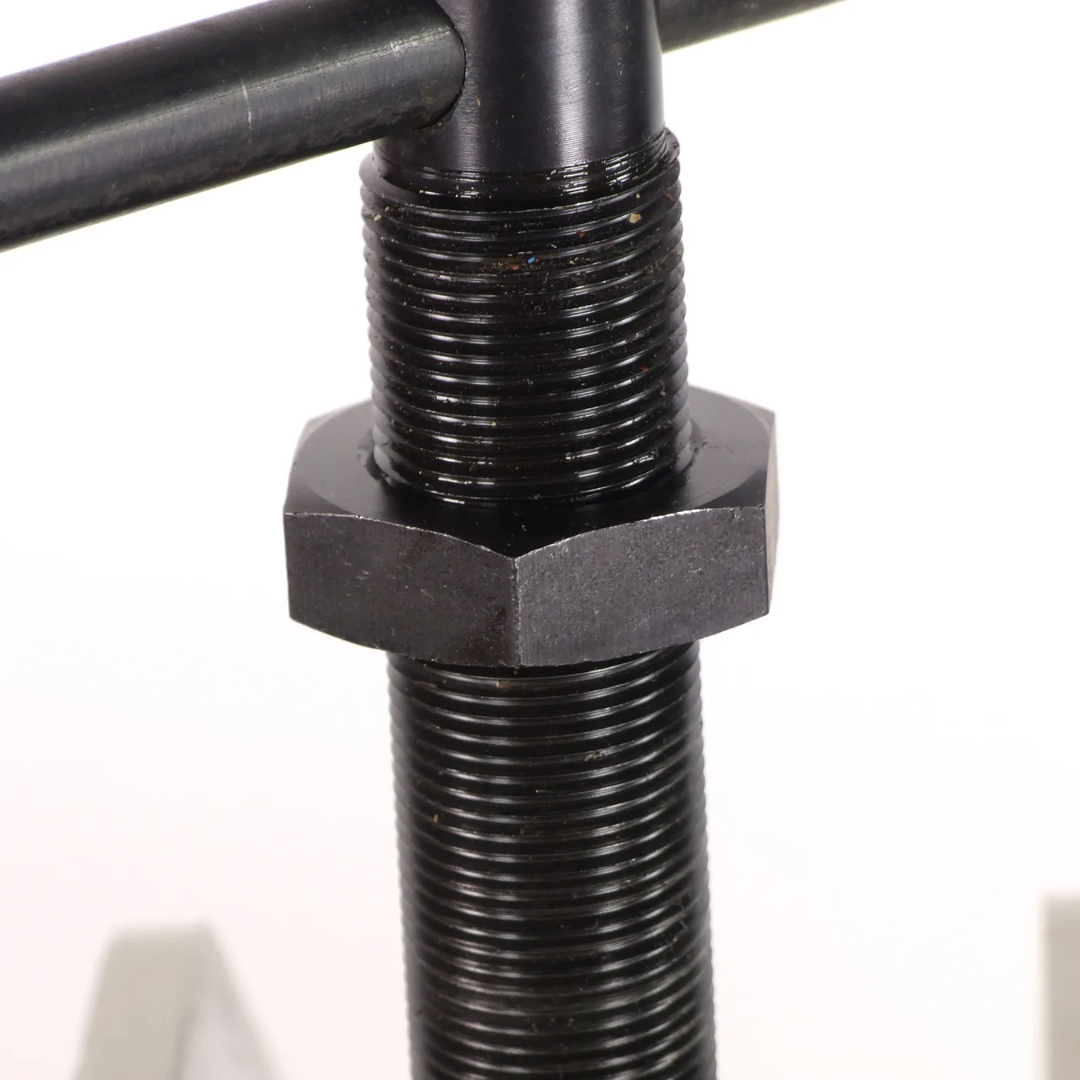 Threaded adjustment screw detail on the Baileigh Radius Bender - (R-M7) 1006861 providing fine control over bending pressure and material curvature.
