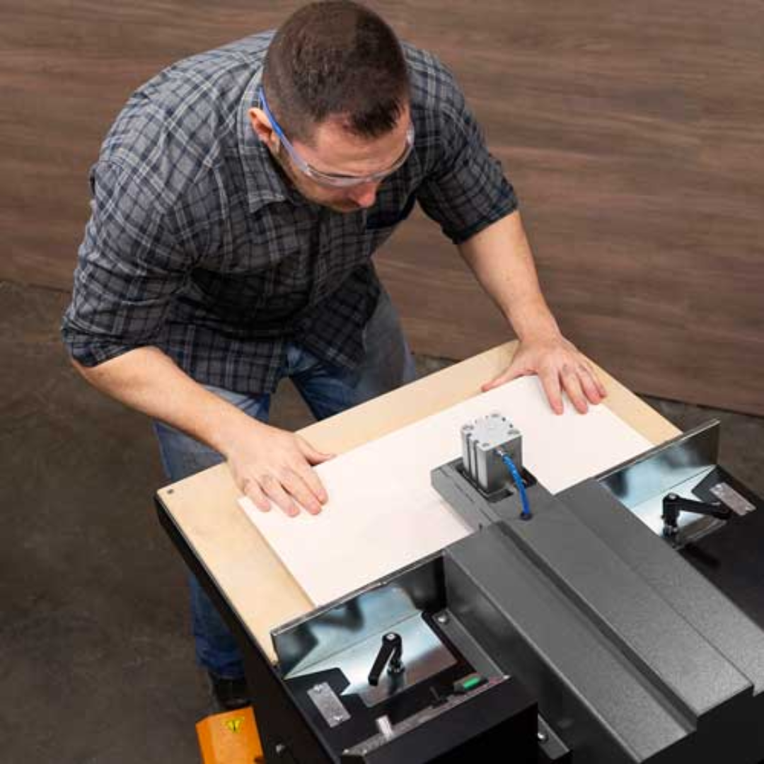 Top-down view of Maksiwa PHM.30 Pocket Hole Machine with wood panel aligned