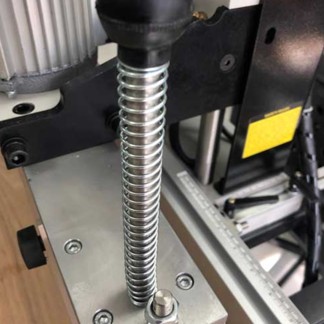 Vertical spindle and guide rod assembly on Maksiwa LINE BORING PNEUMATIC 13 SPINDLE LINE 1 PH line boring machine