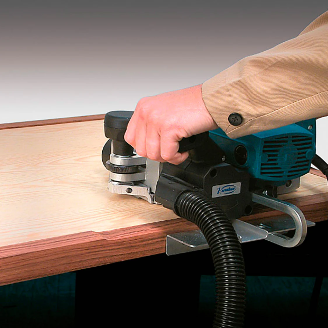 Virutex CE53S Edge Lipping Planer for Perfect Flush Edges 5300199 close-up of planer creating smooth flush edge finish on panel