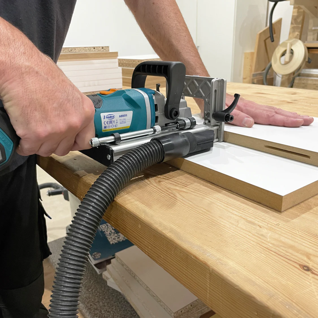 Virutex Cordless Biscuit Joiner ABB311 7900300 performing accurate edge joining on wooden boards