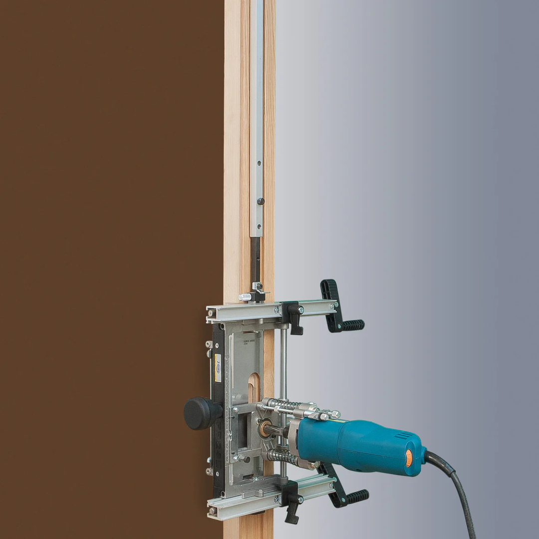 Virutex Router For Fitting Hinges FR129VB (120V) 2900815 mounted vertically on door showing accurate hinge placement and stable operation.