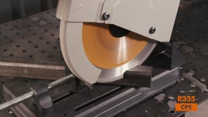 Evolution Power Tools Multi-Material Cutting Chop Saw With 14 in. Blade R355CPS cutting square steel tubing for clean, accurate metal cuts.