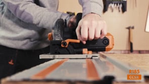 Evolution Power Tools Multi-Material Cutting Circular Saw 7-1/4 in. Blade R185CCSX delivering accurate straight cuts using the included guide track system.