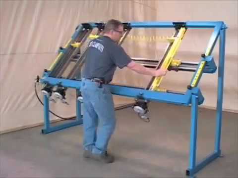 JLT #717C-DDC Double Door Clamp in operation with operator positioning cabinet doors for precise clamping and squaring