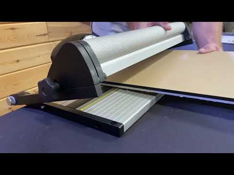 Safetyspeed Helios Substrate Cutter in use cutting sheet material with smooth guided motion for precise substrate trimming.
