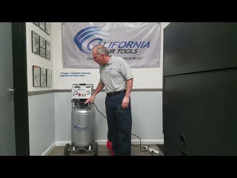 California Air Tools 20020AD Ultra Quiet 20-Gallon Air Compressor in use powering pneumatic tools in a workshop environment