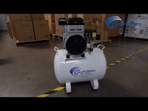 California Air Tools 10020SMHAD Ultra Quiet 10 Gallon Air Compressor in workshop demonstration setting