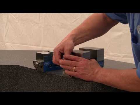 Kurt Modular Vise: 2-1/2" Jaw Width, 1.5000" Jaw Height, 1.0000" Jaw Opening Capacity SCMX250 product demonstration view showing the vise in use for precision workholding and setup operations in a machining environment.
