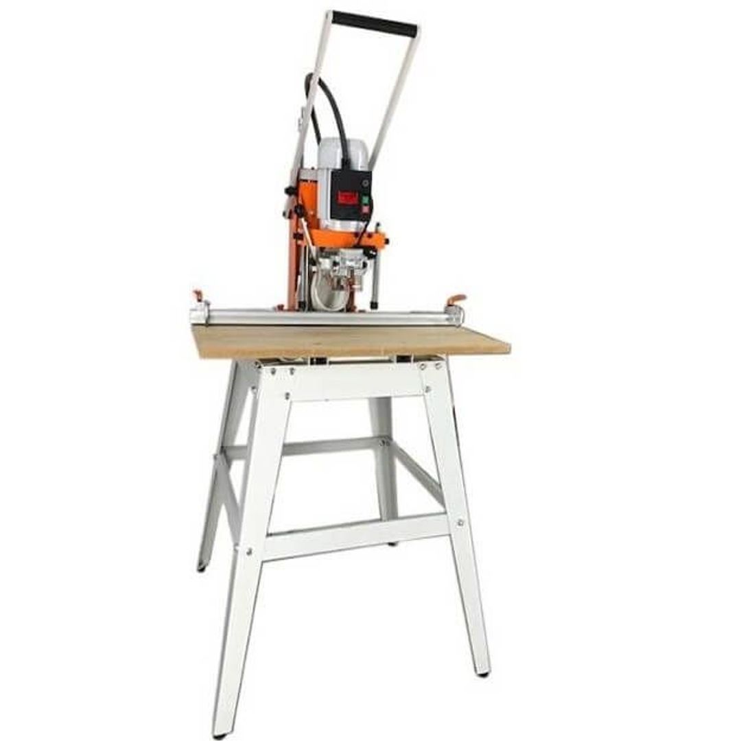 Tooltech MH3 manual hinge boring machine for cabinet doors, mounted on a floor stand.
