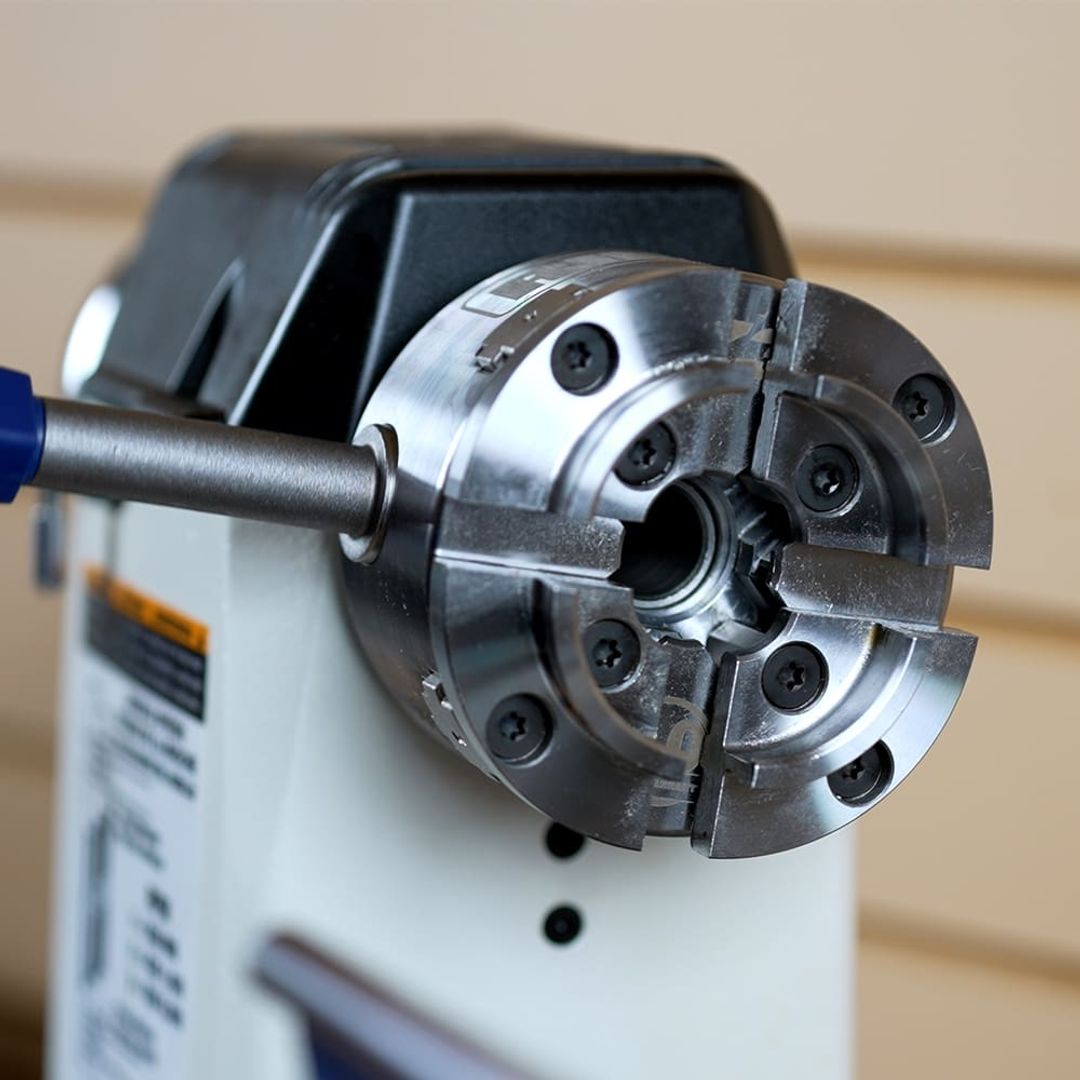 RIKON 71-105 Z3 insert-type lathe chuck, 50mm jaws, with woodscrew and chuck key.