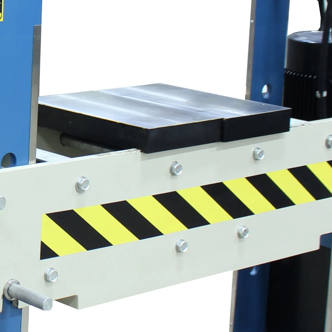 Adjustable press bed on the Baileigh 60/15-Ton Two-Station H-Frame Hydraulic Press (HSP-60M-C) 1019290 providing stable support for a wide range of workpieces.