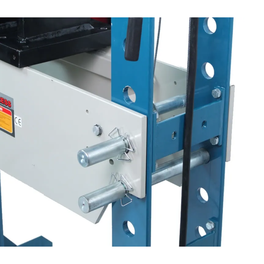 Adjustable work bed support system on Baileigh Shop Press: H Frame, 9.8" Stroke 1004859 allowing flexible setup for various workpiece sizes and pressing tasks.