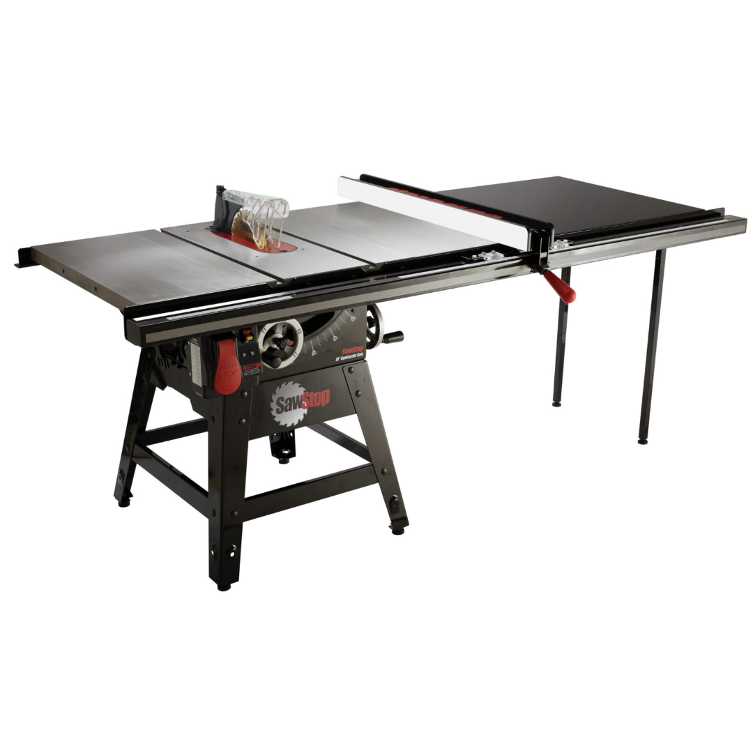 Angled view of the SawStop Contractor Saw with extension table, highlighting spacious work surface and professional workshop functionality.